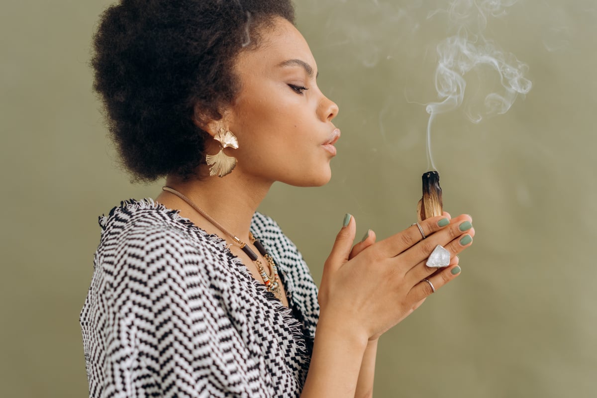 Woman Holding Palo Santo